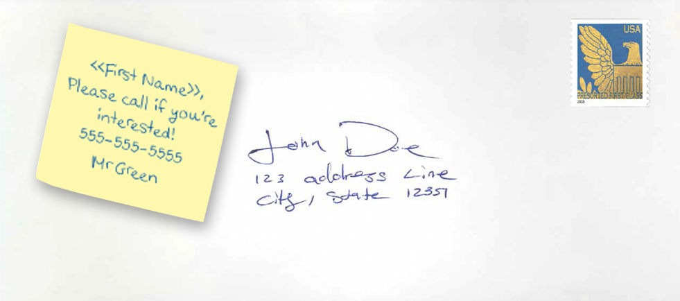 Handwritten note on an envelope with a stamp.